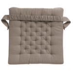 galette de chaise avec un gros noeud