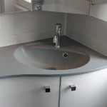 tapis d'angle salle de bain